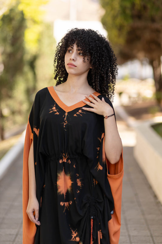 Kafta ampla com ajuste na cintura e na lateral