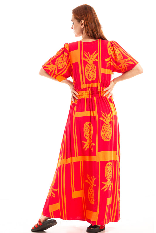 Vestido longo com bolsos externos e detalhe de flor de crochê