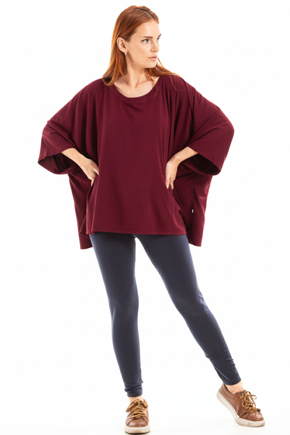 Bata com decote redondo e abertura nas costas