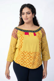 Blusa em patchwork com decote canoa