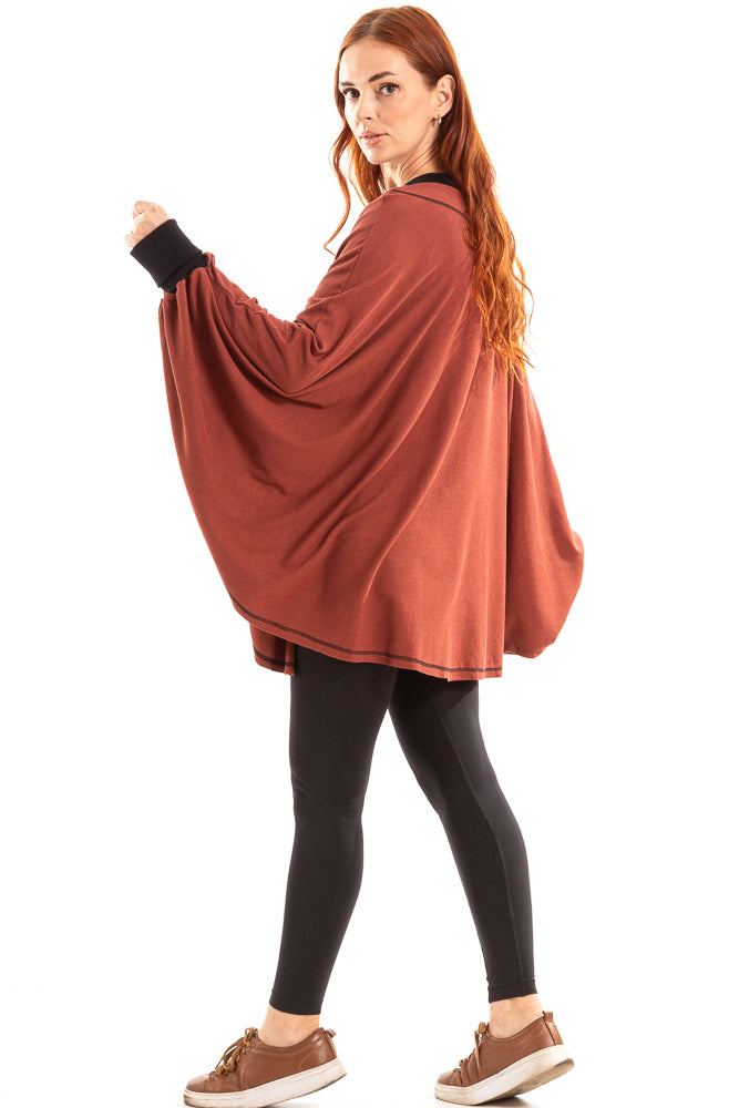 Poncho com cordão de crochê no decote