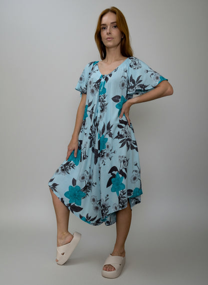 Macacão com pernas largas e abertura tipo polo