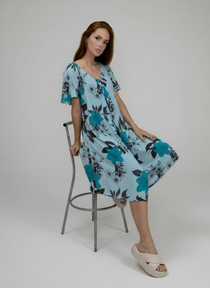 Macacão com pernas largas e abertura tipo polo