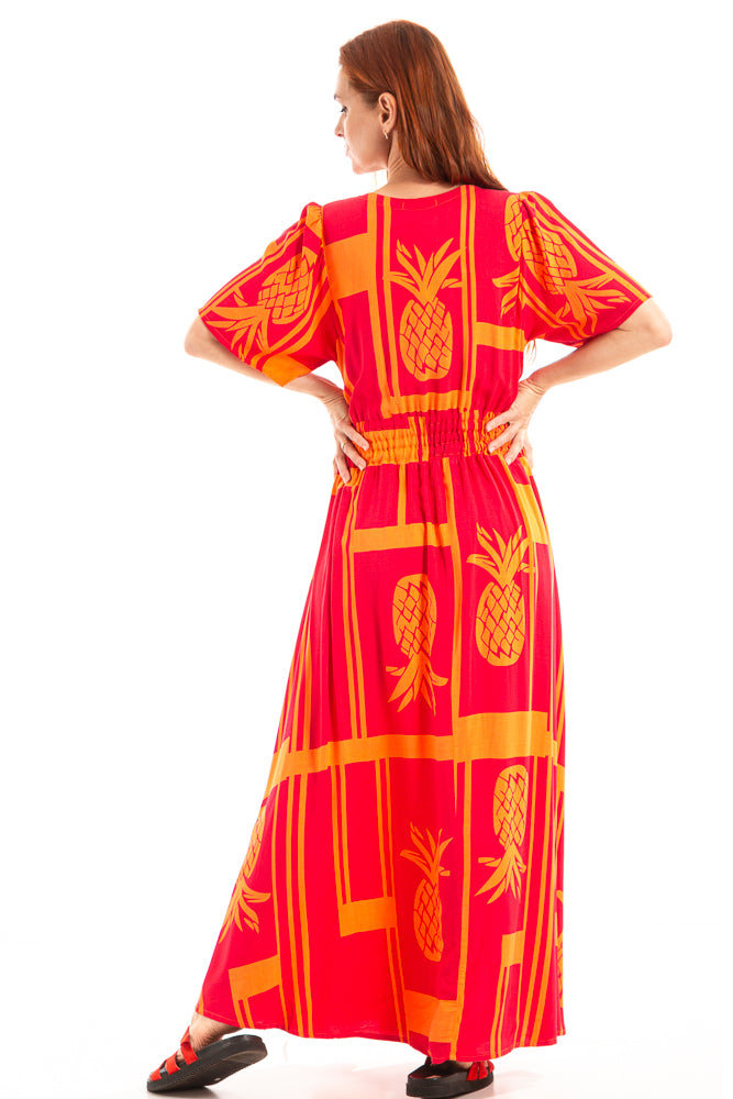 Vestido longo com bolsos externos e detalhe de flor de crochê