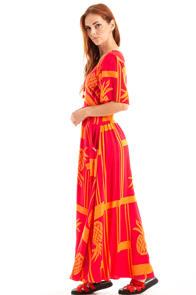 Vestido longo com bolsos externos e detalhe de flor de crochê